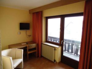 TV a/nebo společenská místnost v ubytování Hotel Hiemer