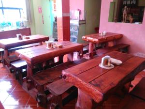 Ein Restaurant oder anderes Speiselokal in der Unterkunft Casa Huespedes El Molino 