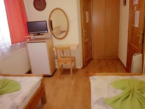 Postel nebo postele na pokoji v ubytování Hotel Amarillis