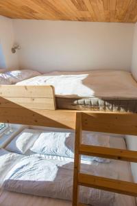Postel nebo postele na pokoji v ubytování Nefsholt