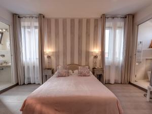 Postel nebo postele na pokoji v ubytování Hotel Palagi
