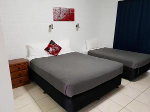 Postel nebo postele na pokoji v ubytování Capricorn Hotel + 6 fotografií