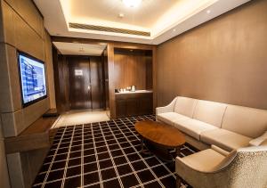 TV o dispositivi per l'intrattenimento presso Royal Century Hotel Shanghai