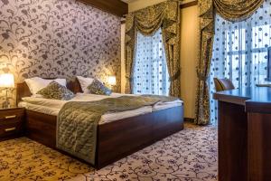 Кровать или кровати в номере Hotel-Restauracja Platan