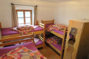 Katil atau katil-katil dalam bilik di SnowBunnys BackPackers Hostel