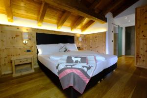 Postel nebo postele na pokoji v ubytování Hotel Shandranj