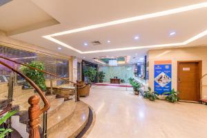 Лобби или стойка регистрации в Kaiserdom Hotel Baiyun Airport