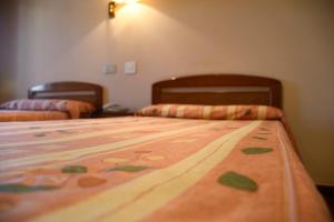 Hotel Azaharにあるベッド