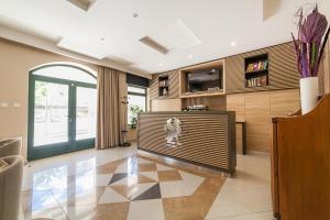 TV a/nebo společenská místnost v ubytování Apartments Grifone Lux