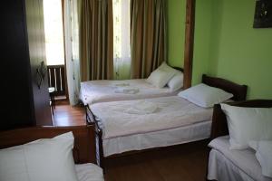 Postel nebo postele na pokoji v ubytování Salome Guest House
