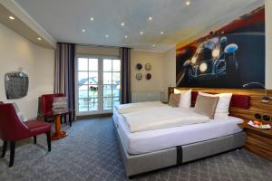 Postel nebo postele na pokoji v ubytování Hotel Rech