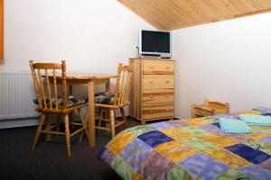 A bed or beds in a room at Privat Mrzkan