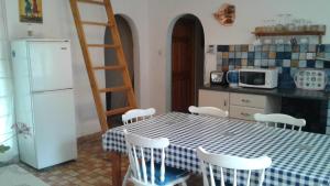 Kuchyň nebo kuchyňský kout v ubytování Paz Cottage