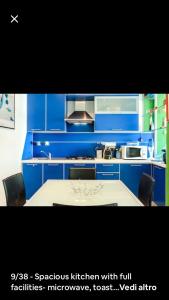A kitchen or kitchenette at Appartamento Villa Panorama
