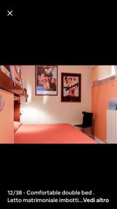 A bed or beds in a room at Appartamento Villa Panorama
