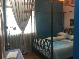 מיטה או מיטות בחדר ב-Sherry Luxury Homestay