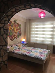 Кровать или кровати в номере Deeps Hostel Eskişehir