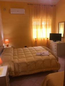 Postel nebo postele na pokoji v ubytování Cilento