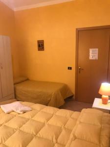 Postel nebo postele na pokoji v ubytování Cilento
