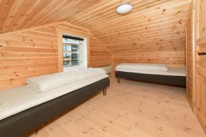 เตียงในห้องที่ Kongsberg Booking