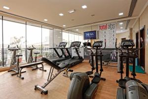 The fitness centre and/or fitness facilities at MENA ApartHotel Albarsha At The Mall