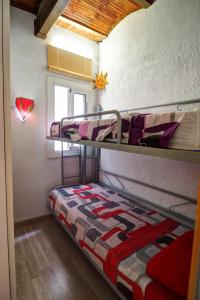 Posteľ alebo postele v izbe v ubytovaní Aquarium Apartment by Hello Homes Sitges