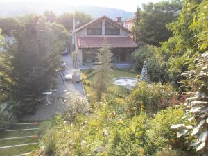 a view of a house with a garden at Joanna in Stavroupoli