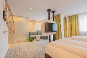 Postel nebo postele na pokoji v ubytování Hotel Luise