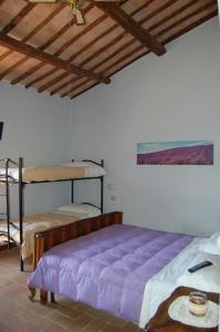 A bed or beds in a room at Agriturismo Castro