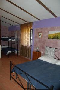 A bed or beds in a room at Agriturismo Castro