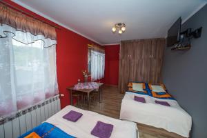 Postel nebo postele na pokoji v ubytování Noclegi u Bernadków