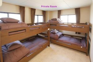 Postel nebo postele na pokoji v ubytování Guest House Sonomama