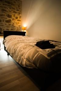 Llit o llits en una habitació de Gîtes du tellin