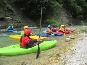 a group of people in kayaks on a river at Alla Casetta B&B in Cesiomaggiore