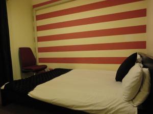 Postel nebo postele na pokoji v ubytování City View Hotel