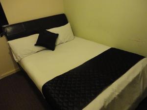 Postel nebo postele na pokoji v ubytování City View Hotel