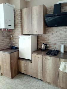 A kitchen or kitchenette at Apartment complex Parklend