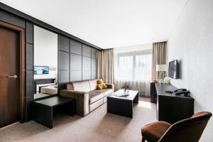 TV a/nebo společenská místnost v ubytování Amberton Hotel Klaipeda