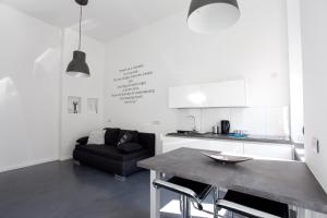 Et opholdsområde på Mini Loft Design - With Sauna