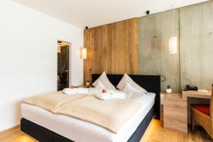 Voodi või voodid majutusasutuse Villa Postillion am See toas