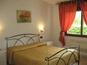 A bed or beds in a room at B & B OASI