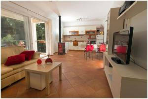 Kuchyň nebo kuchyňský kout v ubytování Apartments FRAGOLINA