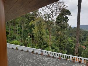 Uma varanda ou terraço em Dew Drops Farm Resorts