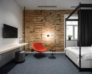 Postel nebo postele na pokoji v ubytování BURSA Hotel Kyiv