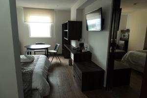 Voodi või voodid majutusasutuse Lithio Hotel toas