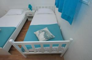 Un ou plusieurs lits dans un hébergement de l'établissement Apartment Afrodita