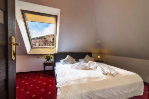 Łóżko lub łóżka w pokoju w obiekcie Pałac Margot Nature&SPA