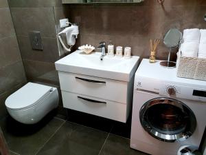 Kúpeľňa v ubytovaní Luxury Apartment Sweet Dreams + 37 fotografií