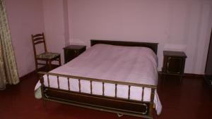 Katil atau katil-katil dalam bilik di Merabi and Neli Guest House