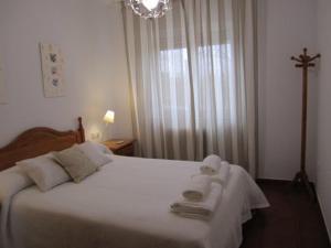 Posteľ alebo postele v izbe v ubytovaní Tres Hermanos CON PISCINA PRIVADA + 18 fotografií